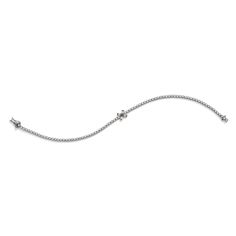 Exploding X Shaped Diamonds Floating on a White Diamond Line Bracelet set in 18K Blackened White Gold